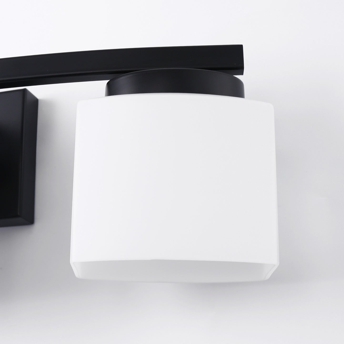 24 in. 3 Light Matte Black Modern Industrial Square Vanity Light for Bathroom with Curved Arms and Milk White Shades