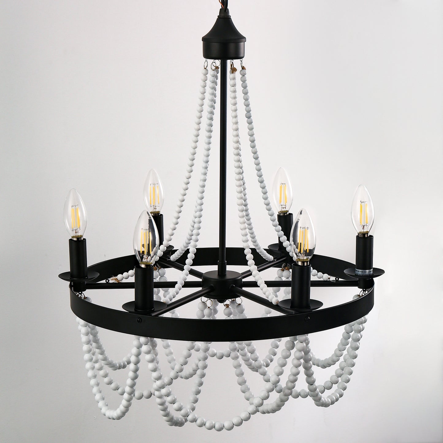 YANSUN 6-Light Matte Black Branch Wagon Wheel Chandelier with White Wooden Beads,E12 Base,Boho Modern Pendant Light for Kitchen