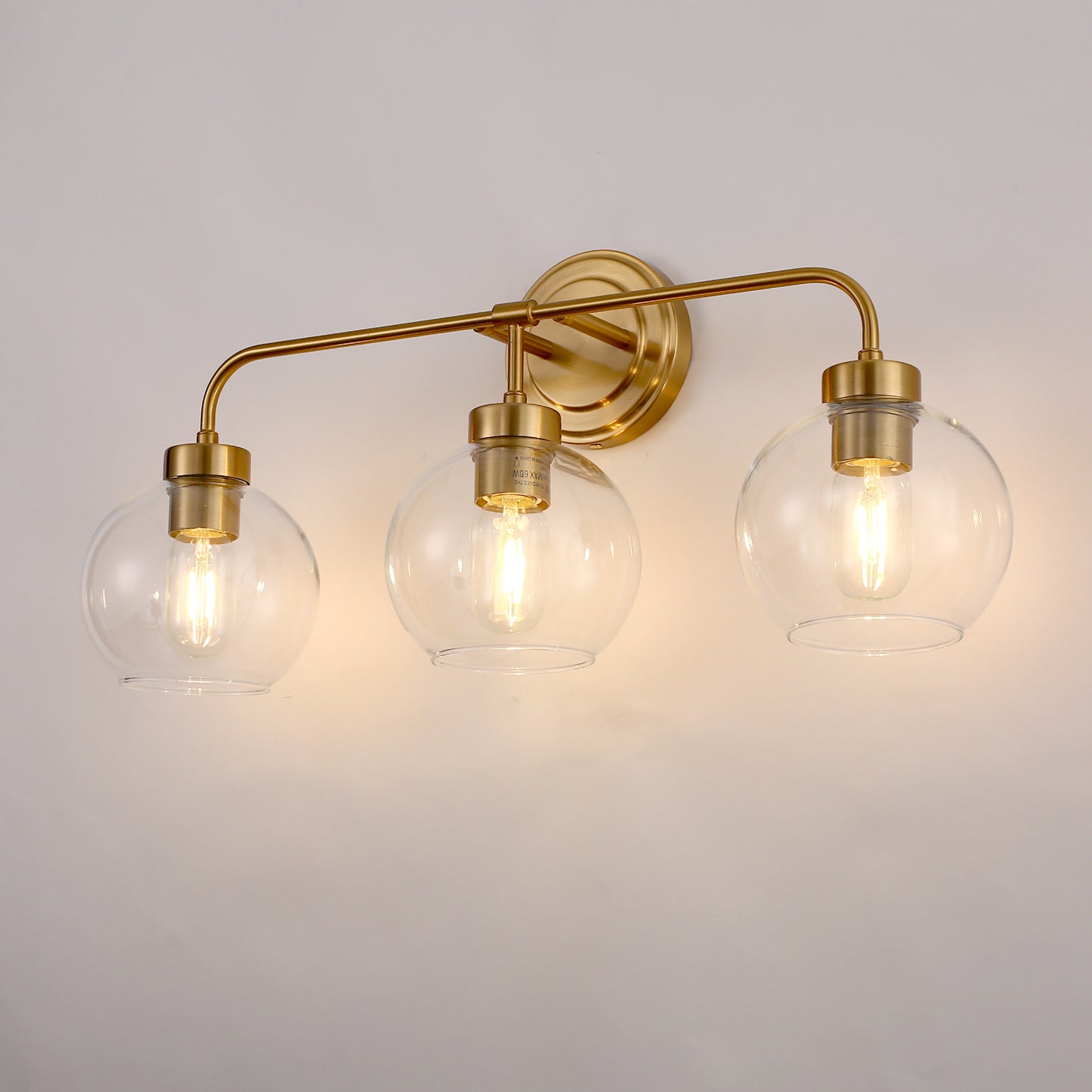 24 in. 3-Light Mid-Century Modern Globe Bathroom Vanity Light, Brass Gold Round Wall Fixture with Clear Glass Shades