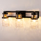23 in. 3-Light Black and Gold Industrial Cylinder Vanity Light for Bathroom Mirror with Water Glass Shades