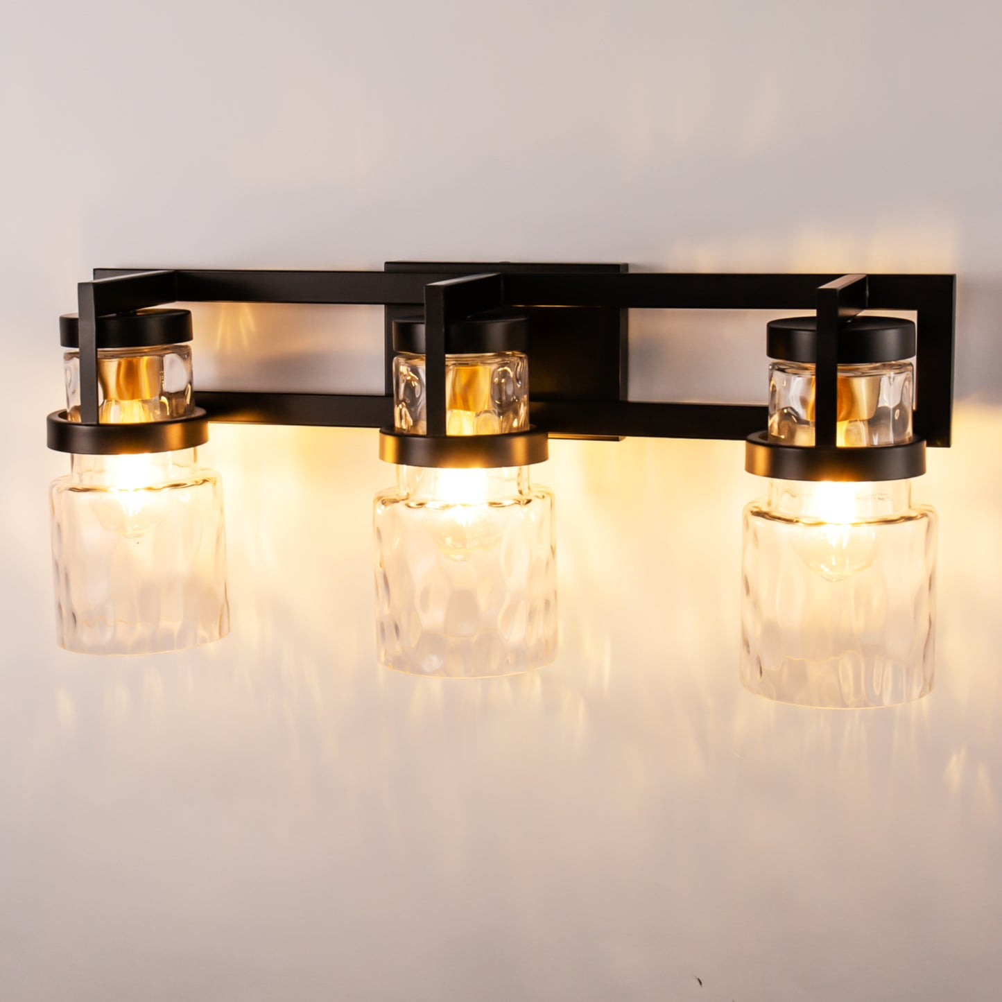 23 in. 3-Light Black and Gold Industrial Cylinder Vanity Light for Bathroom Mirror with Water Glass Shades