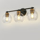 22 in. 3-Light Black and Gold Modern Bathroom Vanity Light with Clear Glass Shades, Wall Sconce for Large Spaces