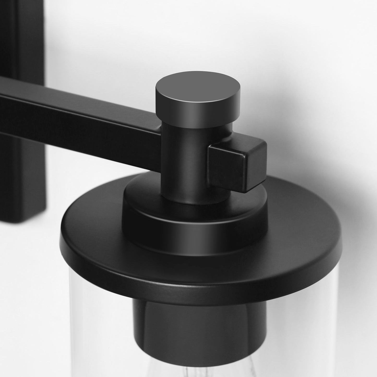 28 in. 4 Light Matte Black Industrial Modern Cylinder Vanity Light for Bathroom with Clear Glass Shades
