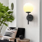 5.91 in. 1-Light Black Modern Globe Wall Sconce with Frosted Glass Shade for Bedroom Hallway