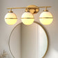 24 in. Modern 3-Light Bathroom Vanity Light with Farmhouse Heritage Brass Globe Shade